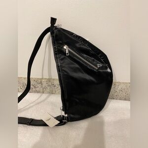 NWT URBAN OUTFITTERS BLACK SLING CROSSBODY. 14x9. Adjustable strap.